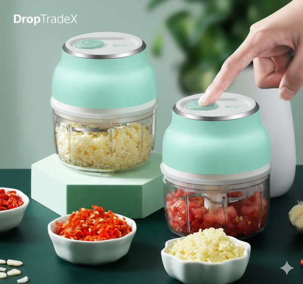 DropTradeX compact electric food chopper in use, chopping vegetables like onions and tomatoes in transparent containers on a kitchen counter